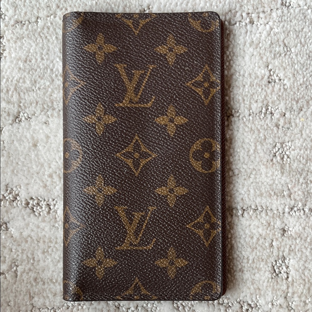 Louis Vuitton Brown and Tan Monogram Checkbook cover.